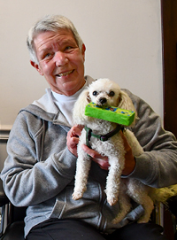Mary Clark with her dog, Buddy