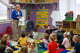 First State Bank visits a daycare center