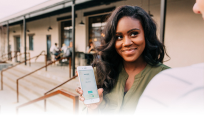 Woman showing BaZing benefits on her phone