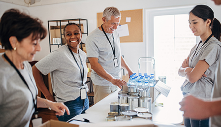 Volunteers sorting donations together